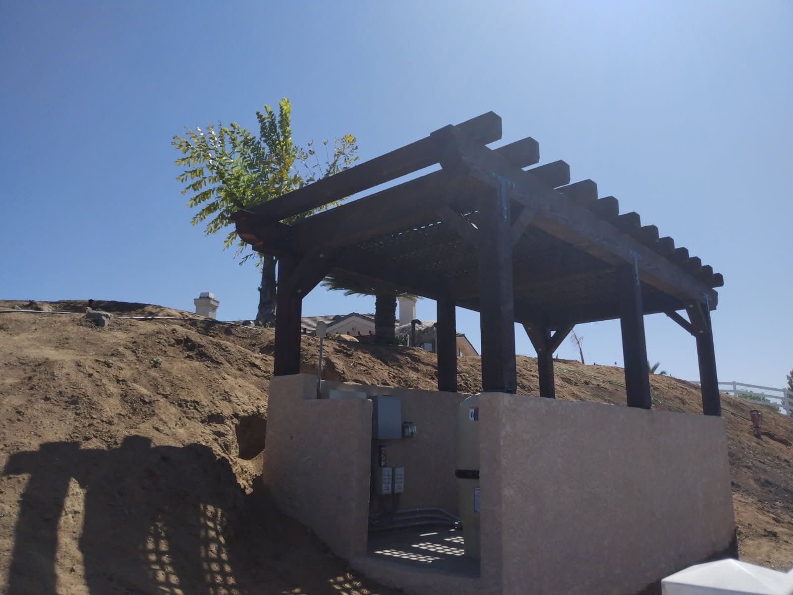 Project Sturdy Wooden Pergola Enhances Hillside Setting image