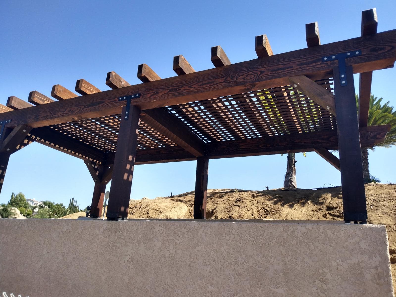 Gallery photos for Sturdy Wooden Pergola Enhances Hillside Setting: Image #1